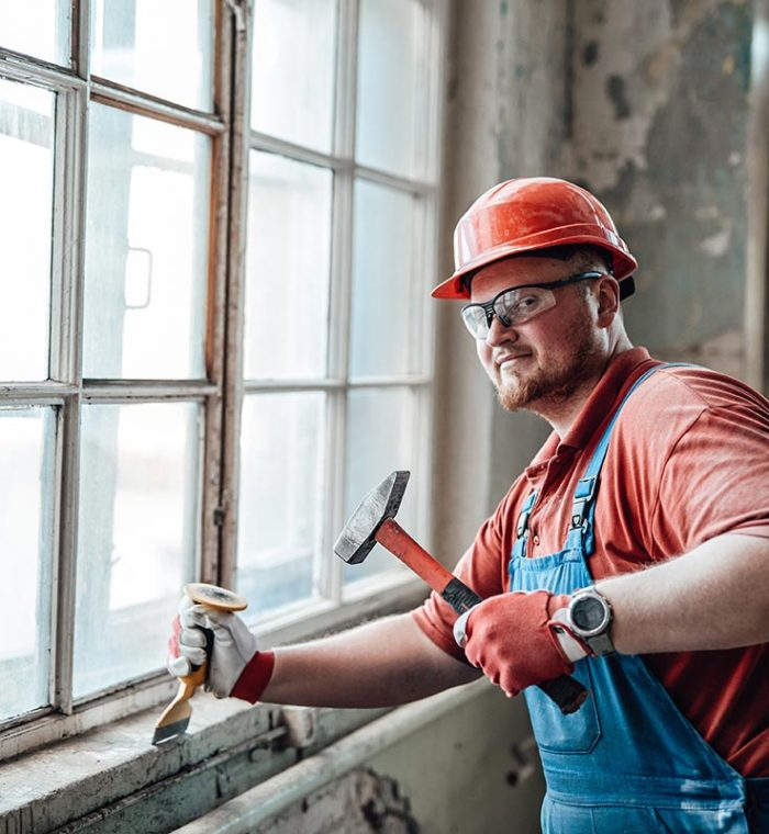 builder-on-a-construction-site-working-on-a-brick-resize.jpg