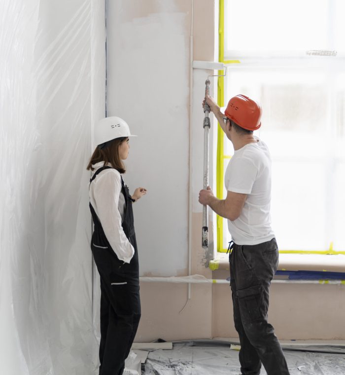 full-shot-people-painting-walls